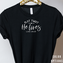 Load image into Gallery viewer, Easter Collection: He lives in White font Unisex short sleeve t-shirt