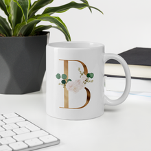 Load image into Gallery viewer, Gold letter mug with one design choice per letter